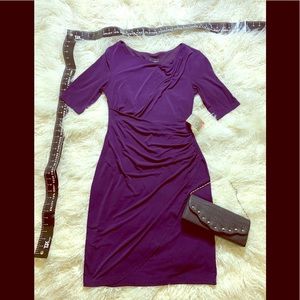 A Purple dress that clings to the body